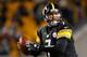 PITTSBURGH, PA - DECEMBER 15: Ben Roethlisberger #7 of the Pittsburgh Steelers looks to throw a second quarter pass while playing the Cincinnati Bengals at Heinz Field on December 15, 2013 in Pittsburgh, Pennsylvania. (Photo by Gregory Shamus/Getty Images)
