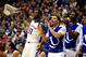 LAWRENCE, KS - DECEMBER 21: Jamari Traylor #31 of the Kansas Jayhawks and teammates react from the bench after the Jayhawks scored during the game against the Georgetown Hoyas at Allen Fieldhouse on December 21, 2013 in Lawrence, Kansas. (Photo by Jamie Squire/Getty Images)