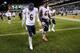 PHILADELPHIA, PA - DECEMBER 22: Jay Cutler #6 of the Chicago Bears walks off of the field with Jordan Mills #67 following the game against the Philadelphia Eagles at Lincoln Financial Field on December 22, 2013 in Philadelphia, Pennsylvania. The Eagles defeat the Bears 54-11. (Photo by Maddie Meyer/Getty Images)