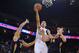 December 17, 2013; Oakland, CA, USA; Golden State Warriors point guard Stephen Curry (30, center) shoots the ball against New Orleans Pelicans power forward Ryan Anderson (33, left) and center Jason Smith (14) during the second quarter at Oracle Arena. Mandatory Credit: Kyle Terada-USA TODAY Sports
