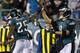 PHILADELPHIA, PA - DECEMBER 22: Running back LeSean McCoy #25 of the Philadelphia Eagles is congratulated by quarterback Nick Foles #9 after scoring a touchdown against the Chicago Bears in during the third quarter of a game at Lincoln Financial Field on December 22, 2013 in Philadelphia, Pennsylvania. The Eagles defeated the Bears 54-11. (Photo by Rich Schultz /Getty Images)