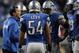 Dec 22, 2013; Detroit, MI, USA; Detroit Lions head coach Jim Schwartz talks to the defense during overtime against the New York Giants at Ford Field. Giants beat the Lions 23-20. Mandatory Credit: Raj Mehta-USA TODAY Sports
