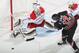RALEIGH, NC - DECEMBER 20: Philipp Grubauer #31 of the Washington Capitals stops a shot by Eric Staal #12 of the Carolina Hurricanes during their NHL game at PNC Arena on December 20, 2013 in Raleigh, North Carolina. (Photo by Gregg Forwerck/NHLI via Getty Images)