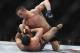 Feb 15, 2012; Omaha, NE, USA; Jake Ellenberger (top) fights with Diego Sanchez in the Main Event during UFC on Fuel TV 1 at Omaha Civic Auditorium. Mandatory Credit: Matt Ryerson-USA TODAY Sports