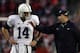 Nov 30, 2013; Madison, WI, USA; Penn State Nittany Lions head coach Bill O'Brien talks to quarterback Christian Hackenberg (14) during the game with the Wisconsin Badgers at Camp Randall Stadium. Penn State defeated Wisconsin 31-24. Mandatory Credit: Mary Langenfeld-USA TODAY Sports