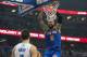 Dec 23, 2013; Orlando, FL, USA; New York Knicks center Tyson Chandler (6) scores a basket against the defends of Orlando Magic center Nikola Vucevic (9) during the first half of the game at the Amway Center. Mandatory Credit: Rob Foldy-USA TODAY Sports