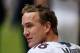 HOUSTON, TX - DECEMBER 22: Peyton Manning #18 of the Denver Broncos waits on the bench during the second half of the game against the Houston Texans at Reliant Stadium on December 22, 2013 in Houston, Texas. (Photo by Scott Halleran/Getty Images)