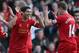 LIVERPOOL, ENGLAND - DECEMBER 21: Luis Suarez of Liverpool celebrates after scoring his second goal with team mate Jordan Henderson during the Barclays Premier League match between Liverpool and Cardiff City at Anfield at Anfield on December 21, 2013 in Liverpool, England. (Photo by Clive Brunskill/Getty Images)