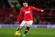 MANCHESTER, ENGLAND - DECEMBER 21: Wayne Rooney of Manchester United in action during the Barclays Premier League match between Manchester United and West Ham United at Old Trafford on December 21, 2013 in Manchester, England. (Photo by Stu Forster/Getty Images)