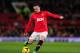 MANCHESTER, ENGLAND - DECEMBER 21: Wayne Rooney of Manchester United in action during the Barclays Premier League match between Manchester United and West Ham United at Old Trafford on December 21, 2013 in Manchester, England. (Photo by Stu Forster/Getty Images)