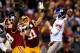 LANDOVER, MD - DECEMBER 01: Eli Manning #10 of the New York Giants throws the ball against the Washington Redskins during their game at FedExField on December 1, 2013 in Landover, Maryland. (Photo by Rob Carr/Getty Images)