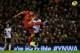 LIVERPOOL, ENGLAND - DECEMBER 4: Luis Suarez of Liverpool scores his first goal from a long range effort during the Barclays Premier League match between Liverpool and Norwich City at Anfield on December 4, 2013 in Liverpool, England. (Photo by Jan Kruger/Getty Images)