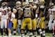 NEW ORLEANS, LA - NOVEMBER 06: Pierre Thomas #23 of the New Orleans Saints is congratulated by teammate Drew Brees #9 during their game against the Tampa Bay Buccaneers at Mercedes-Benz Superdome on November 6, 2011 in New Orleans, Louisiana. (Photo by Streeter Lecka/Getty Images)