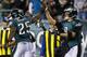 PHILADELPHIA, PA - DECEMBER 22: Running back LeSean McCoy #25 of the Philadelphia Eagles is congratulated by quarterback Nick Foles #9 after scoring a touchdown against the Chicago Bears in during the third quarter of a game at Lincoln Financial Field on December 22, 2013 in Philadelphia, Pennsylvania. The Eagles defeated the Bears 54-11. (Photo by Rich Schultz /Getty Images)