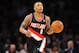 December 1, 2013; Los Angeles, CA, USA; Portland Trail Blazers point guard Damian Lillard (0) moves the ball up court against the Los Angeles Lakers during the first half at Staples Center. Mandatory Credit: Gary A. Vasquez-USA TODAY Sports