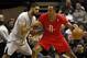 Dec 25, 2013; San Antonio, TX, USA; Houston Rockets center Dwight Howard (right) is defended by San Antonio Spurs forward Tim Duncan (left) during the first half at AT&T Center. Mandatory Credit: Soobum Im-USA TODAY Sports