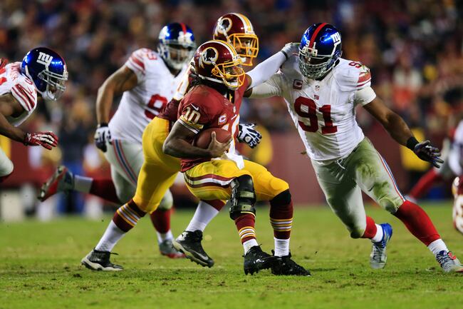 Hi-res-452972523-defensive-end-justin-tuck-of-the-new-york-giants-sacks_crop_north