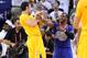 Dec 25, 2013; Oakland, CA, USA; Golden State Warriors center Andrew Bogut (12) avoids a shove from Los Angeles Clippers point guard Chris Paul (3) after the game at Oracle Arena. Mandatory Credit: Kelley L Cox-USA TODAY Sports