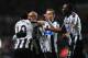 NEWCASTLE UPON TYNE, ENGLAND - DECEMBER 26: Newcastle player Yoan Gouffran (c) celebrates with team mates after scoring the second goal during the Barclays Premier League match between Newcastle United and Stoke City at St James' Park on December 26, 2013 in Newcastle upon Tyne, England. (Photo by Stu Forster/Getty Images)
