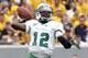 PITTSBURGH, PA - SEPTEMBER 01: Rakeem Cato #12 of the Marshall Thundering Herd drops back to pass against the West Virginia Mountaineers during the game on September 1, 2012 at Mountaineer Field in Morgantown, West Virginia. (Photo by Justin K. Aller/Getty Images)