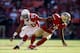 SAN FRANCISCO, CA - OCTOBER 13: Kyle Williams #10 of the San Francisco 49ers runs away from Antoine Cason #20 of the Arizona Cardinals at Candlestick Park on October 13, 2013 in San Francisco, California. (Photo by Ezra Shaw/Getty Images)