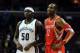 Oct 25, 2013; Memphis, TN, USA; Memphis Grizzlies power forward Zach Randolph (50) and Houston Rockets center Dwight Howard (12) talk during a timeout during the second quarter at FedExForum. The Rockets won 92-73. Mandatory Credit: Justin Ford-USA TODAY Sports