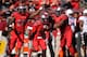 PISCATAWAY, NJ - NOVEMBER 02: Johnathan Aiken #26 of the Rutgers Scarlet Knights celebrates with teammates Delon Stephenson #27 and Marcus Thompson #48 after an interception during the first quarter against the Temple Owls at High Point Solutions Stadium on November 2, 2013 in Piscataway, New Jersey. (Photo by Maddie Meyer/Getty Images)