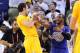Dec 25, 2013; Oakland, CA, USA; Golden State Warriors center Andrew Bogut (12) avoids a shove from Los Angeles Clippers point guard Chris Paul (3) after the game at Oracle Arena. Mandatory Credit: Kelley L Cox-USA TODAY Sports