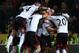 LONDON, ENGLAND - DECEMBER 26: Scott Parker (2nd R) of Fulham celebrates with team-mates after scoring the winning goal during the Barclays Premier League match between Norwich City and Fulham at Carrow Road on December 26, 2013 in London, England. (Photo by Charlie Crowhurst/Getty Images)