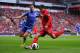 LIVERPOOL, ENGLAND - APRIL 21: Cesar Azpilicueta of Chelsea closes down Philippe Coutinho of Liverpool during the Barclays Premier League match between Liverpool and Chelsea at Anfield on April 21, 2013 in Liverpool, England. (Photo by Michael Regan/Getty Images)
