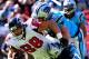 CHARLOTTE, NC - NOVEMBER 03: Luke Kuechly #59 and Robert Lester #38 of the Carolina Panthers tackle Tony Gonzalez #88 of the Atlanta Falcons during play at Bank of America Stadium on November 3, 2013 in Charlotte, North Carolina. (Photo by Grant Halverson/Getty Images)