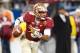 Dec 7, 2013; Charlotte, NC, USA; Florida State Seminoles quarterback Jameis Winston (5) runs the ball during the first quarter against the Duke Blue Devils at Bank of America Stadium. Mandatory Credit: Jeremy Brevard-USA TODAY Sports