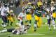 Nov 4, 2013; Green Bay, WI, USA; Green Bay Packers running back Eddie Lacy (27) breaks a tackle by Chicago Bears safety Chris Conte (47) for a 57-yard run in the 3rd quarter at Lambeau Field. Mandatory Credit: Benny Sieu-USA TODAY Sports