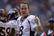 Dec 22, 2013; Houston, TX, USA; Denver Broncos quarterback Peyton Manning (18) gives a thumbs up to cheering fans against the Houston Texans during the second half at Reliant Stadium. The Broncos won 37-13. Mandatory Credit: Thomas Campbell-USA TODAY Sports