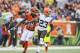 Nov 17, 2013; Cincinnati, OH, USA; Cincinnati Bengals wide receiver A.J. Green (18) is defended by Cleveland Browns cornerback Joe Haden (23) during the first half at Paul Brown Stadium. Mandatory Credit: Kevin Jairaj-USA TODAY Sports