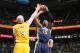 SALT LAKE CITY, UT - DECEMBER 27: Derrick Favors #15 of the Utah Jazz shoots against Chris Kaman #9 of the Los Angeles Lakers at EnergySolutions Arena on December 27, 2013 in Salt Lake City, Utah. NOTE TO USER: User expressly acknowledges and agrees that, by downloading and or using this Photograph, User is consenting to the terms and conditions of the Getty Images License Agreement. Mandatory Copyright Notice: Copyright 2013 NBAE (Photo by Melissa Majchrzak/NBAE via Getty Images)