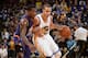 OAKLAND, CA - DECEMBER 27: Stephen Curry #30 of the Golden State Warriors handles the ball against Eric Bledsoe #2 of the Phoenix Suns on December 27, 2013 at Oracle Arena in Oakland, California. NOTE TO USER: User expressly acknowledges and agrees that, by downloading and or using this photograph, user is consenting to the terms and conditions of Getty Images License Agreement. Mandatory Copyright Notice: Copyright 2013 NBAE (Photo by Noah Graham/NBAE via Getty Images)