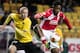 BORAS, SWEDEN - OCTOBER 3: Sebastian Holmen (L) of IF Elfsborg challenges Michy Batshuayi of R. Standard de Liege during the UEFA Europa League group stage match between IF Elfsborg and R. Standard de Liege held on October 3, 2013 at the Boras Arena, in Boras, Sweden. (Photo by Bobbo Lauhage/EuroFootball/Getty Images)