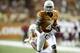 AUSTIN, TX - AUGUST 31: Daje Johnson #4 of the Texas Longhorns breaks free for a 24 yard touchdown run against the New Mexico State Aggies on August 31, 2013 at Darrell K Royal-Texas Memorial Stadium in Austin, Texas. (Photo by Cooper Neill/Getty Images)