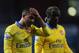 LONDON, ENGLAND - DECEMBER 26: Theo Walcott (L) and Bacary Sagna of Arsenal look on after the Barclays Premier League match between West Ham United and Arsenal at Boleyn Ground on December 26, 2013 in London, England. (Photo by Ian Walton/Getty Images)