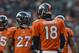 Dec 30 2012; Denver, CO, USA; Denver Broncos quarterback Peyton Manning (18) talks to running back Knowshon Moreno (27) in the first quarter against the Kansas City Chiefs at Sports Authority Field. The Broncos defeated the Chiefs 38-3Mandatory Credit: Ron Chenoy-USA TODAY Sports