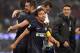 MILAN, ITALY - DECEMBER 22: Yuto Nagatomo of FC Inter Milan celebrates victory at the end of the Serie A match between FC Internazionale Milano and AC Milan at San Siro Stadium on December 22, 2013 in Milan, Italy. (Photo by Claudio Villa/Getty Images)