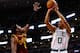 BOSTON, MA - DECEMBER 28: Avery Bradley #0 of the Boston Celtics takes a shot over Kyrie Irving #2 of the Cleveland Cavaliers in the first quarter during the game at TD Garden on December 28, 2013 in Boston, Massachusetts. NOTE TO USER: User expressly acknowledges and agrees that, by downloading and or using this photograph, User is consenting to the terms and conditions of the Getty Images License Agreement. (Photo by Jared Wickerham) (Photo by Jared Wickerham/Getty Images)
