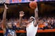 SYRACUSE, NY - DECEMBER 28: C.J. Fair #5 of the Syracuse Orange goes up for two and is fouled by Darrun Hilliard #4 of the Villanova Wildcats while also being defended by James Bell #32 of the Villanova Wildcats in the first half on December 28, 2013 at The Carrier Dome in Syracuse, New York. (Photo by Brett Carlsen/Getty Images)