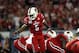 Dec 28, 2013; Orlando, FL, USA; Louisville Cardinals quarterback Teddy Bridgewater (5) gives instructions during the first quarter of the Russell Athletic Bowl against the Miami Hurricanes at Florida Citrus Bowl Stadium. Mandatory Credit: Rob Foldy-USA TODAY Sports