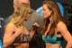 Dec 27, 2013; Las Vegas, NV, USA; Ronda Rousey and Misha Tate face off after the weigh-in for their UFC Women's Bantamweight Title Fight at MGM Grand Garden Arena. Mandatory Credit: Jayne Kamin-Oncea-USA TODAY Sports