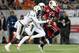 Miami's defense hung tough early, but a lack of offense by the Hurricanes allowed the Cardinals to roll late.