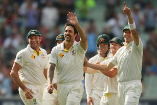 Hi-res-459354263-ryan-harris-and-peter-siddle-congratulate-mitchell_crop_north