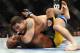 Dec 28, 2013; Las Vegas, NV, USA; Chris Weidman (red gloves) and Anderson Silva (blue gloves) fight during their UFC middleweight championship bout at the MGM Grand Garden Arena. Weidman won. Mandatory Credit: Jayne Kamin-Oncea-USA TODAY Sports
