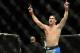 Dec 28, 2013; Las Vegas, NV, USA; Chris Weidman reacts in the cage after defeating Anderson Silva (not pictured) in their UFC middleweight championship bout at the MGM Grand Garden Arena. Mandatory Credit: Jayne Kamin-Oncea-USA TODAY Sports